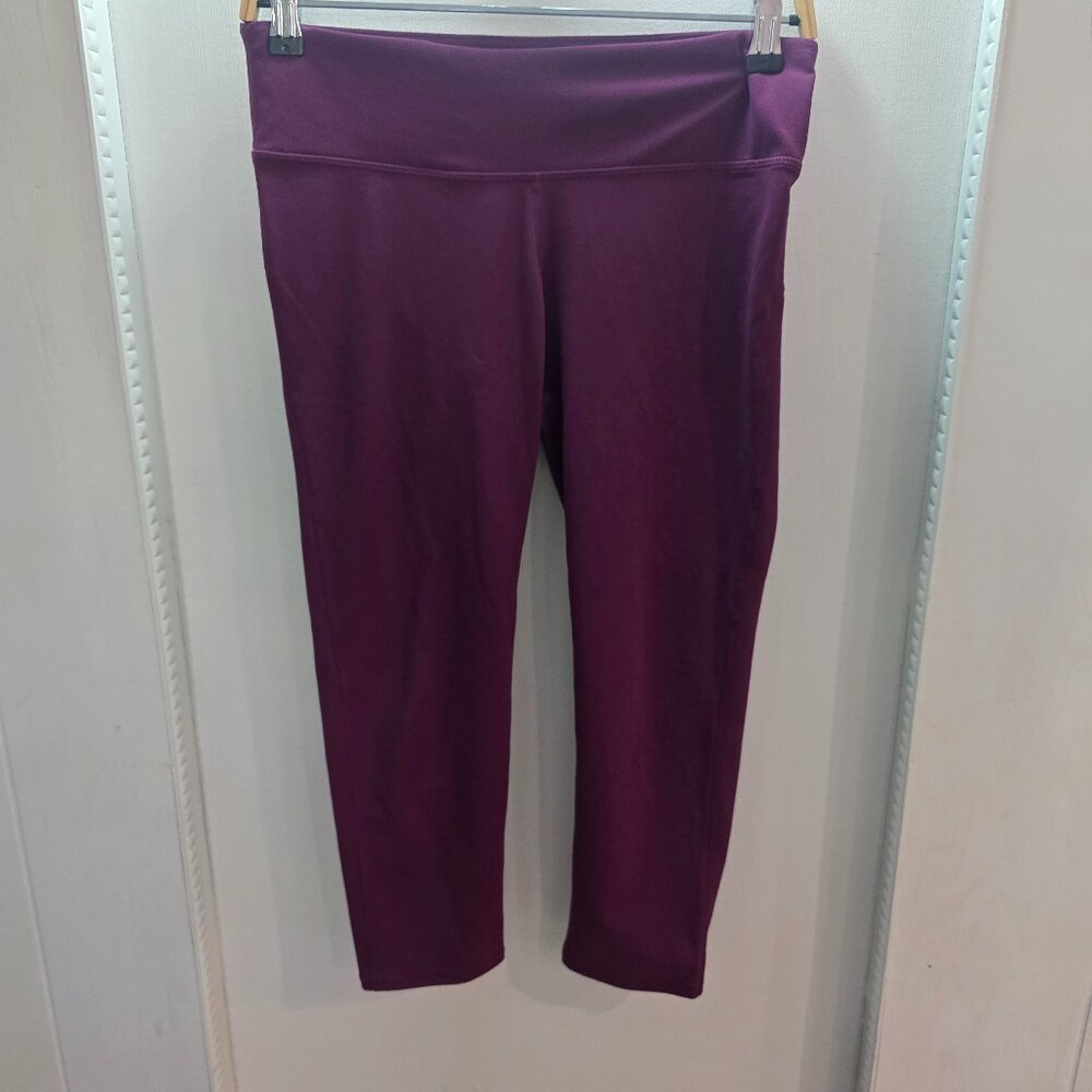 Fabletics PureLuxe Mid-Rise Capri Leggings plum/burgundy Size M